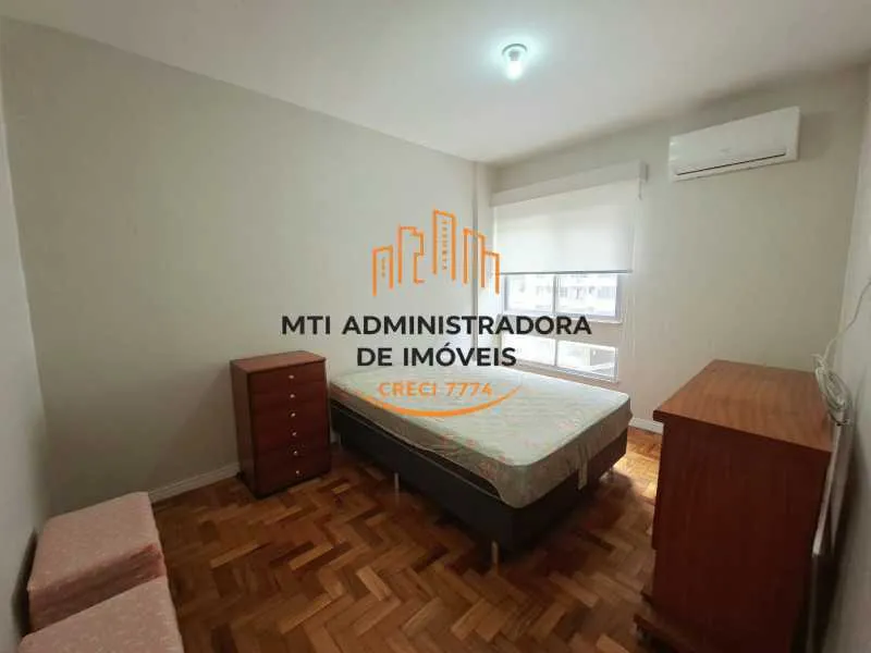 2-bedroom apartment in a building with a pool — photo 3