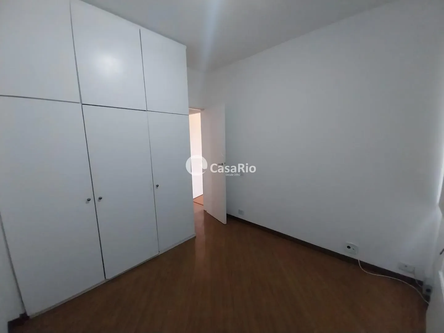 2-bedroom apartment with wood or laminate floors — photo 13