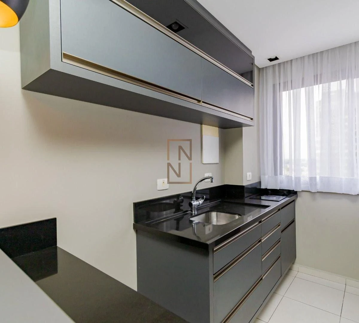 One-bedroom apartment in a building with a sauna