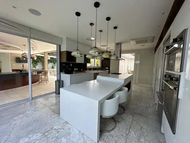 Casa em condomínio com 5 quartos e cozinha integrada — photo 2