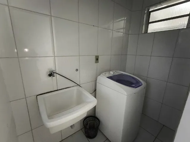 One-bedroom apartment with a washing machine — photo 9