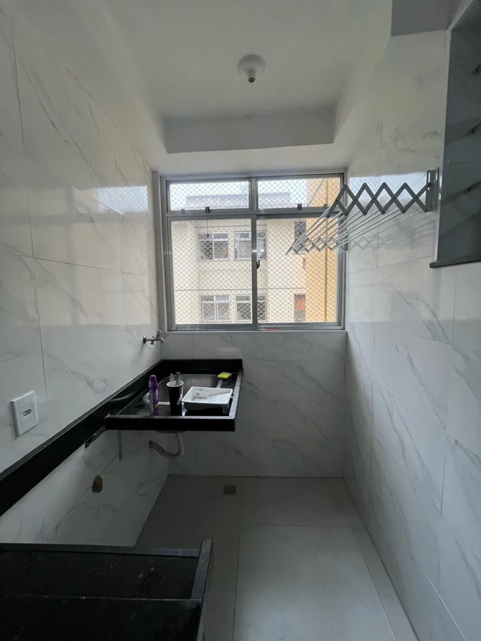 2-bedroom apartment in a building with a pool — photo 8