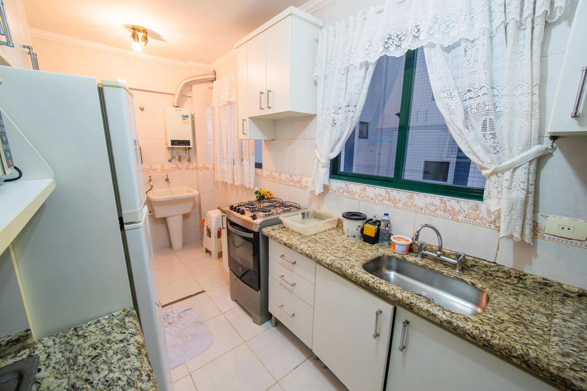 Квартира з 2 спальнями та балконом із грилем — photo 21