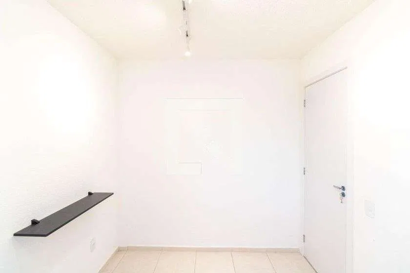 2-bedroom apartment in a building with a pool