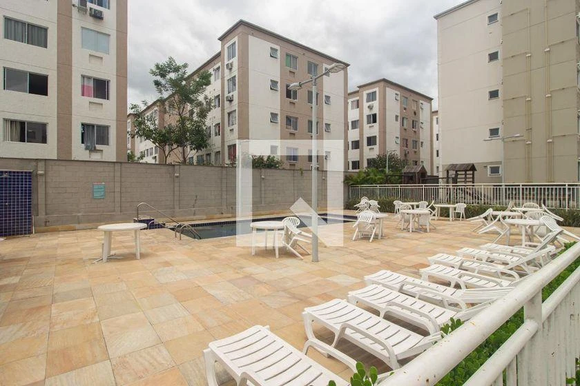2-bedroom apartment in a building with a pool — photo 25