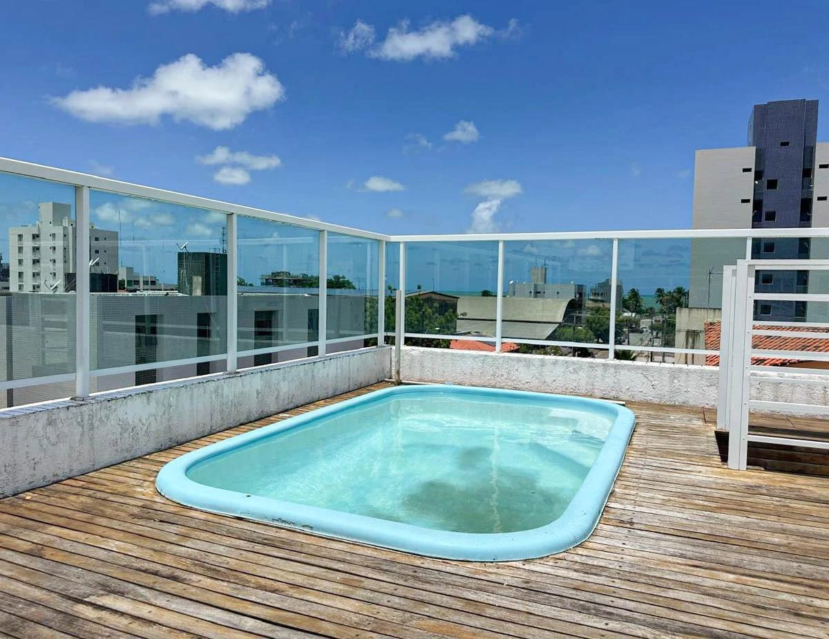 2-bedroom apartment in a building with a pool — photo 10