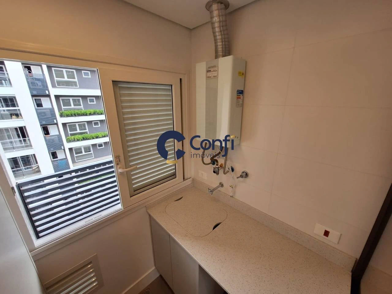 3-bedroom apartment with a grill on the balcony