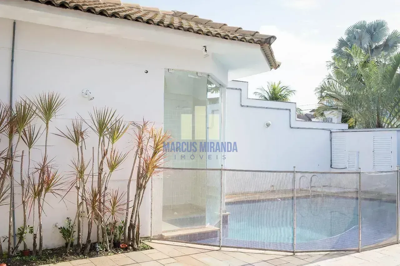 Casa em condomínio com 3 suítes e varanda envidraçada — photo 32