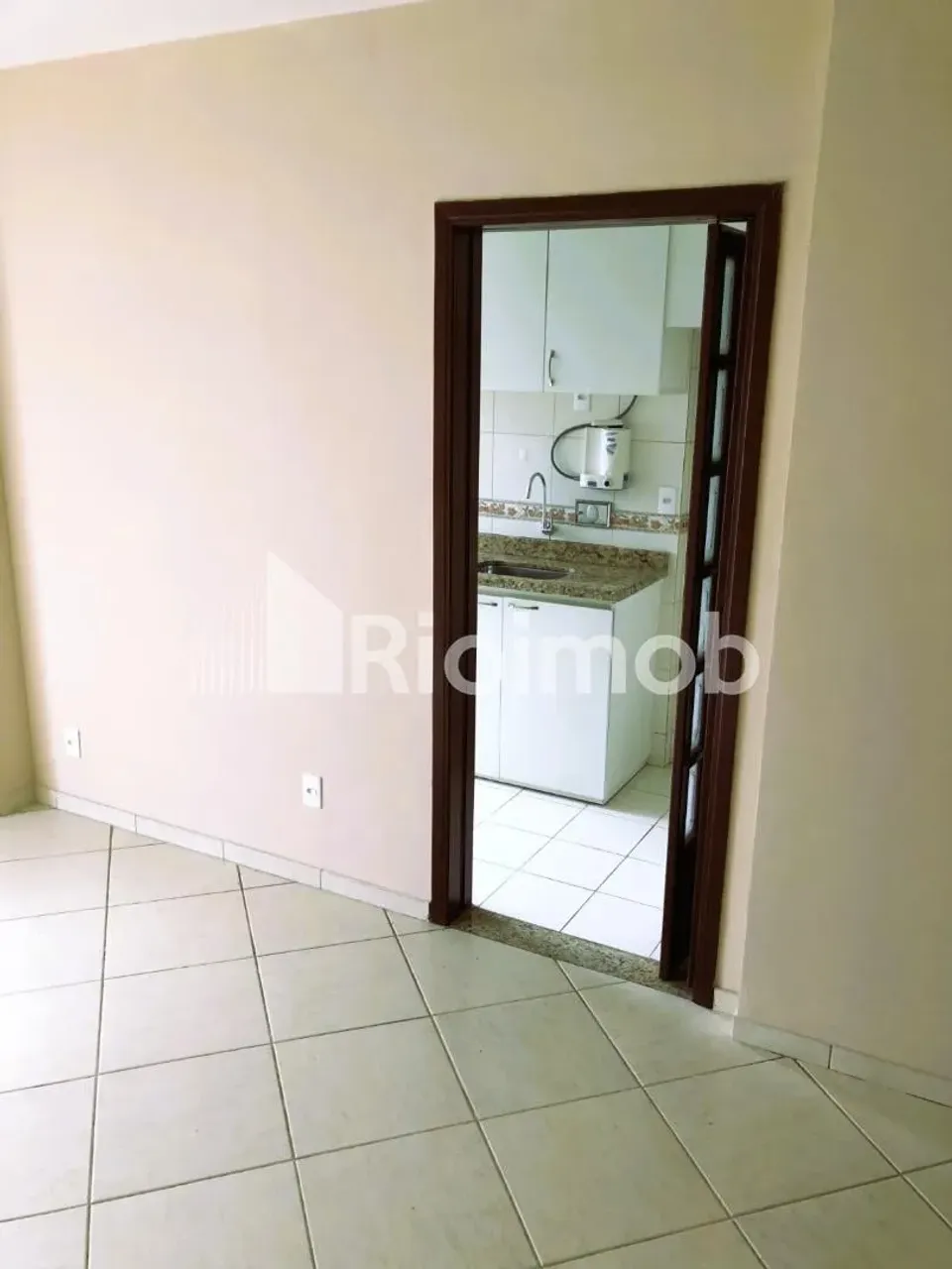 2-bedroom apartment in a building with a pool — photo 9