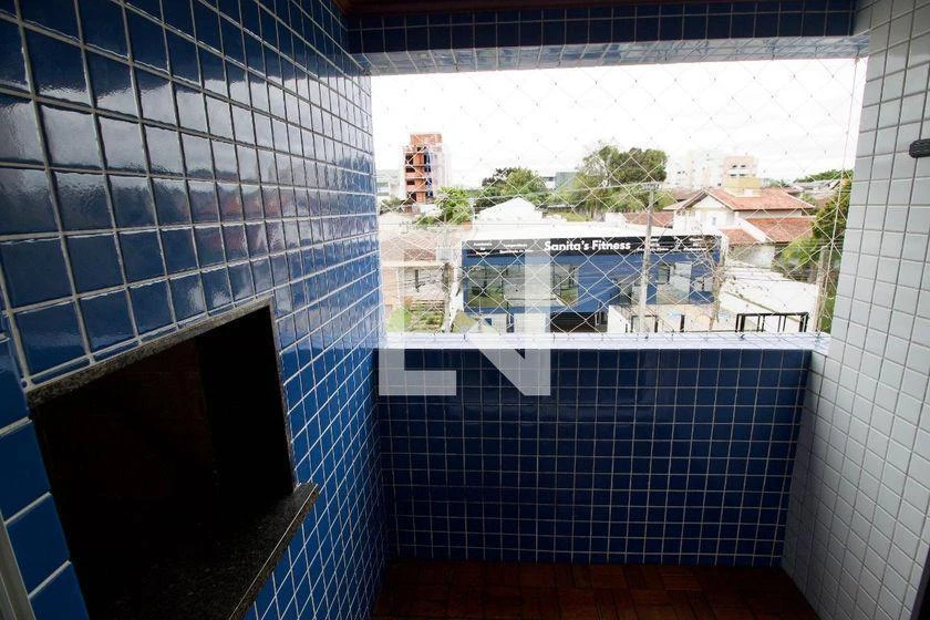 2-bedroom apartment with a grill on the balcony in Curitiba