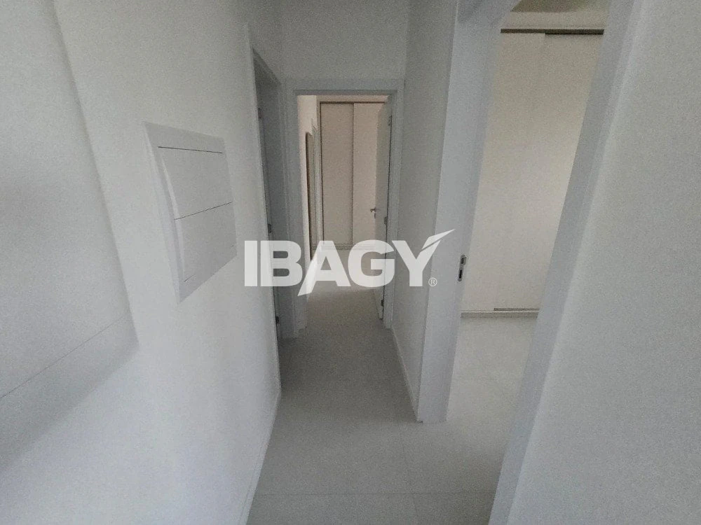 2-bedroom apartment in a building with a pool — photo 15