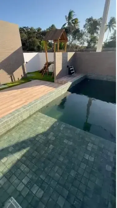 2-bedroom apartment in a building with a pool