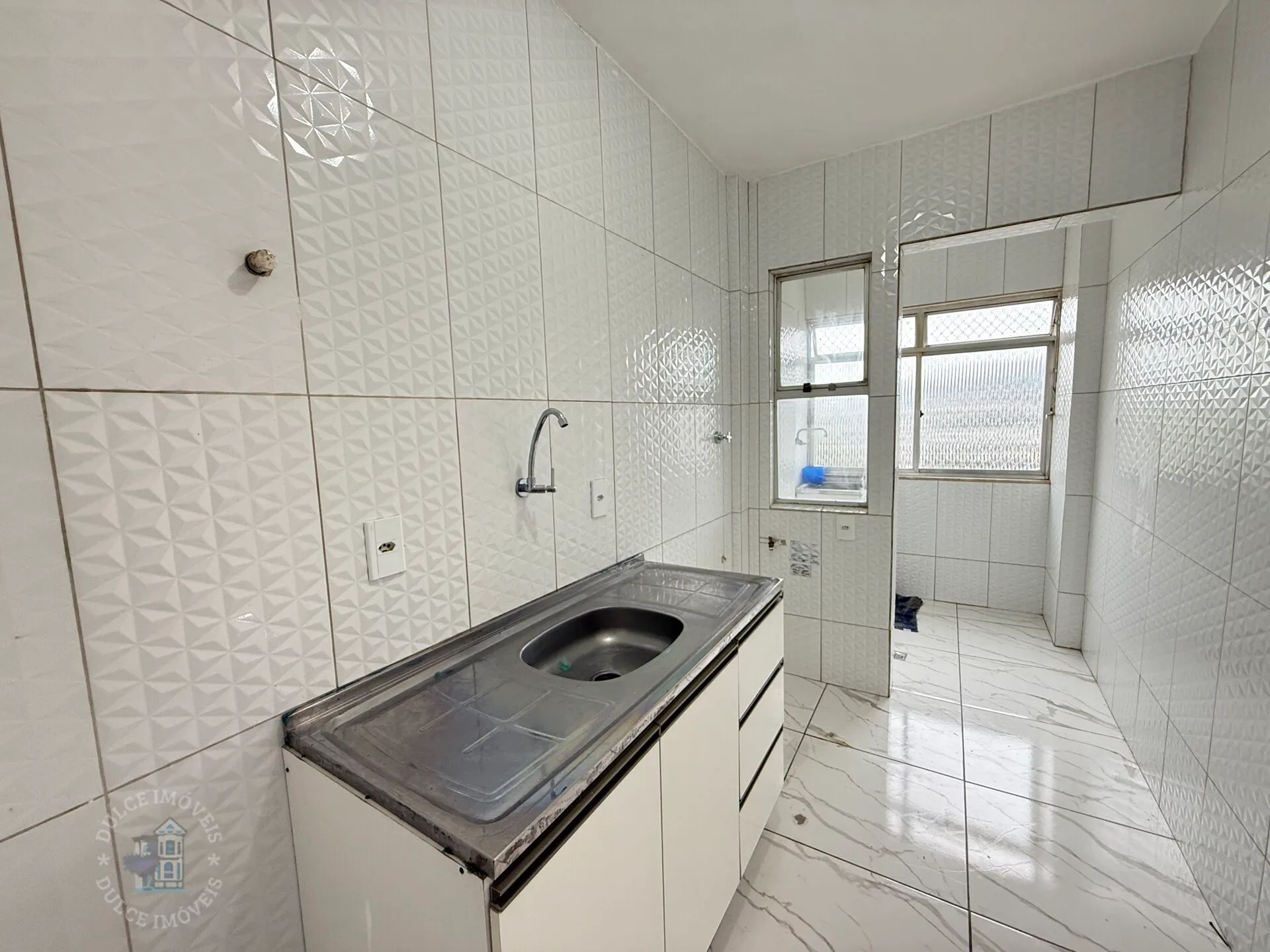 2-bedroom apartment in a building with a pool — photo 16