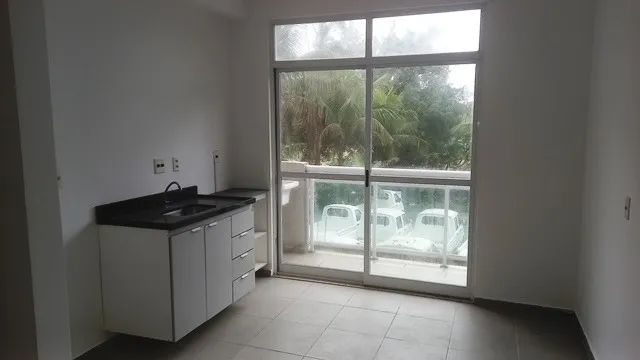 1-bedroom 1-bath apartment with a balcony and parking