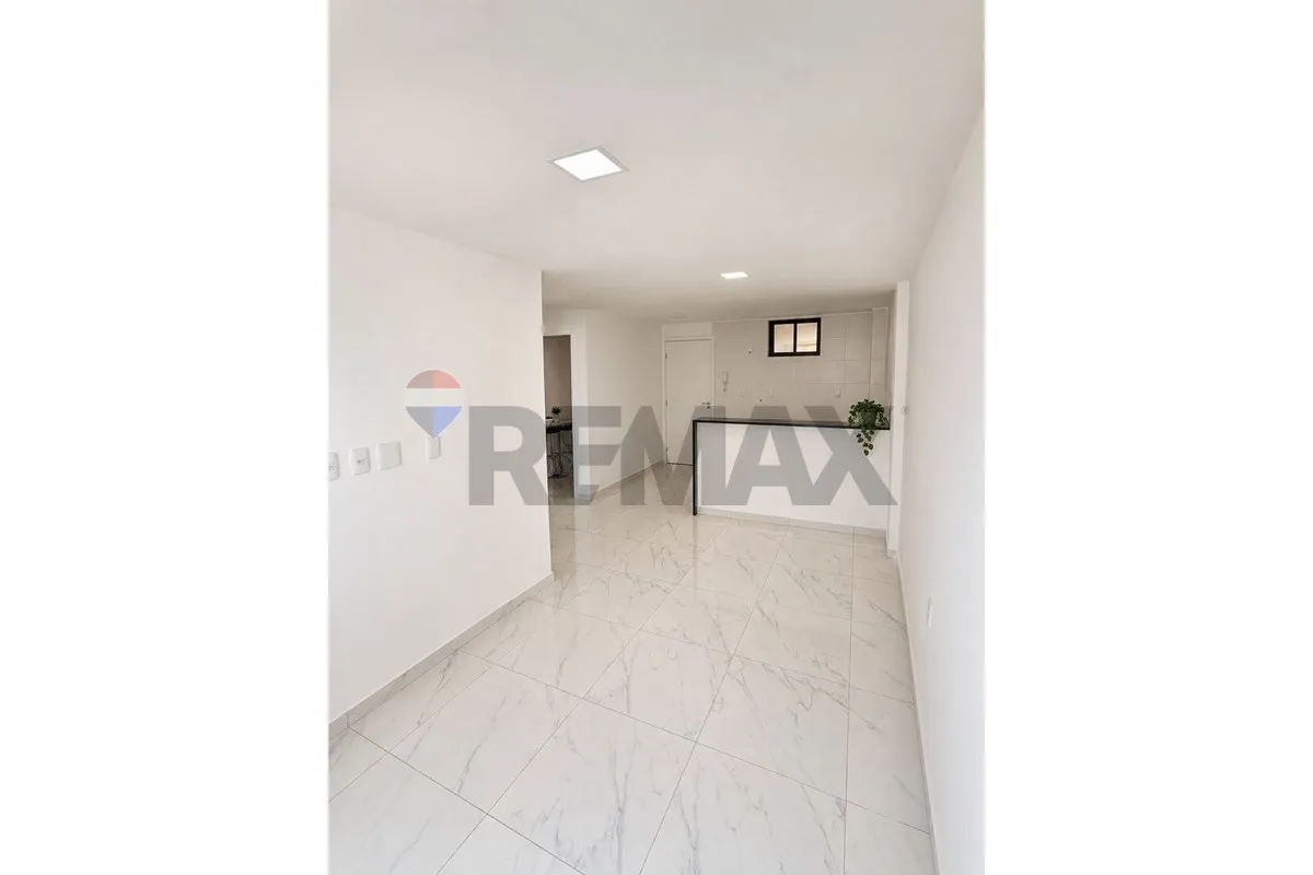 62 m² apartment with open-plan kitchen and private garden