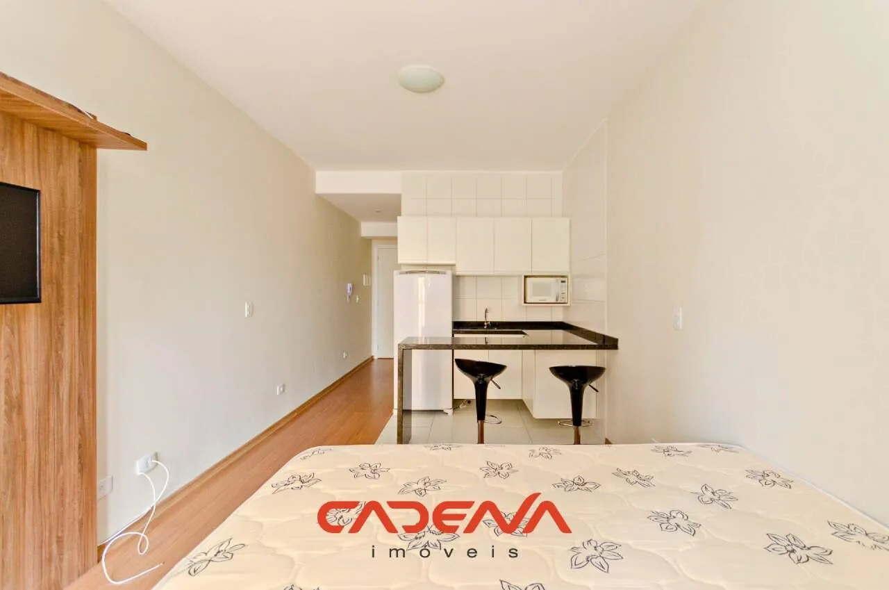 42 m² unfurnished studio with open kitchen and wood floors — photo 9