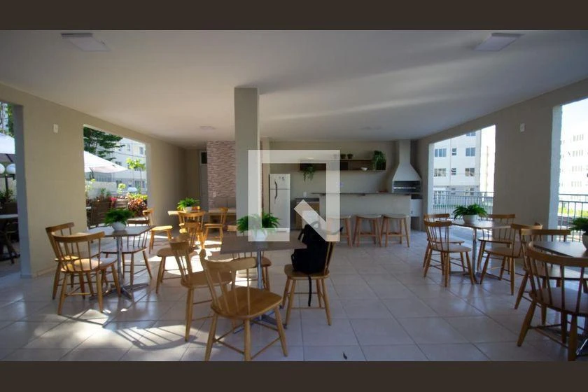 2-bedroom apartment in a building with a pool