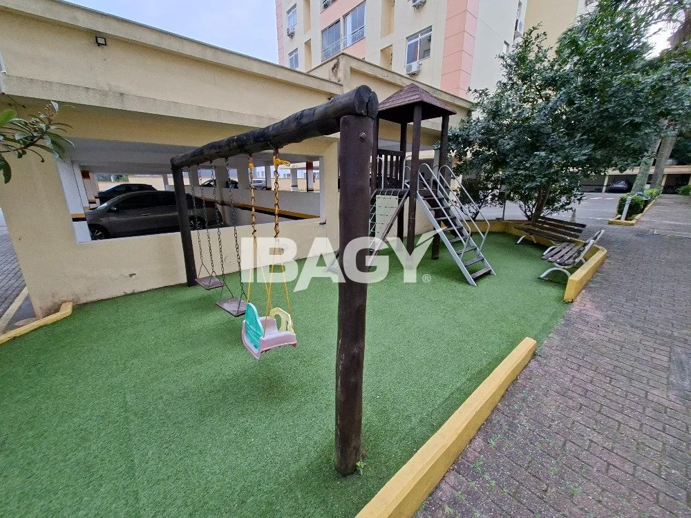 2-bedroom apartment in a building with a pool — photo 14