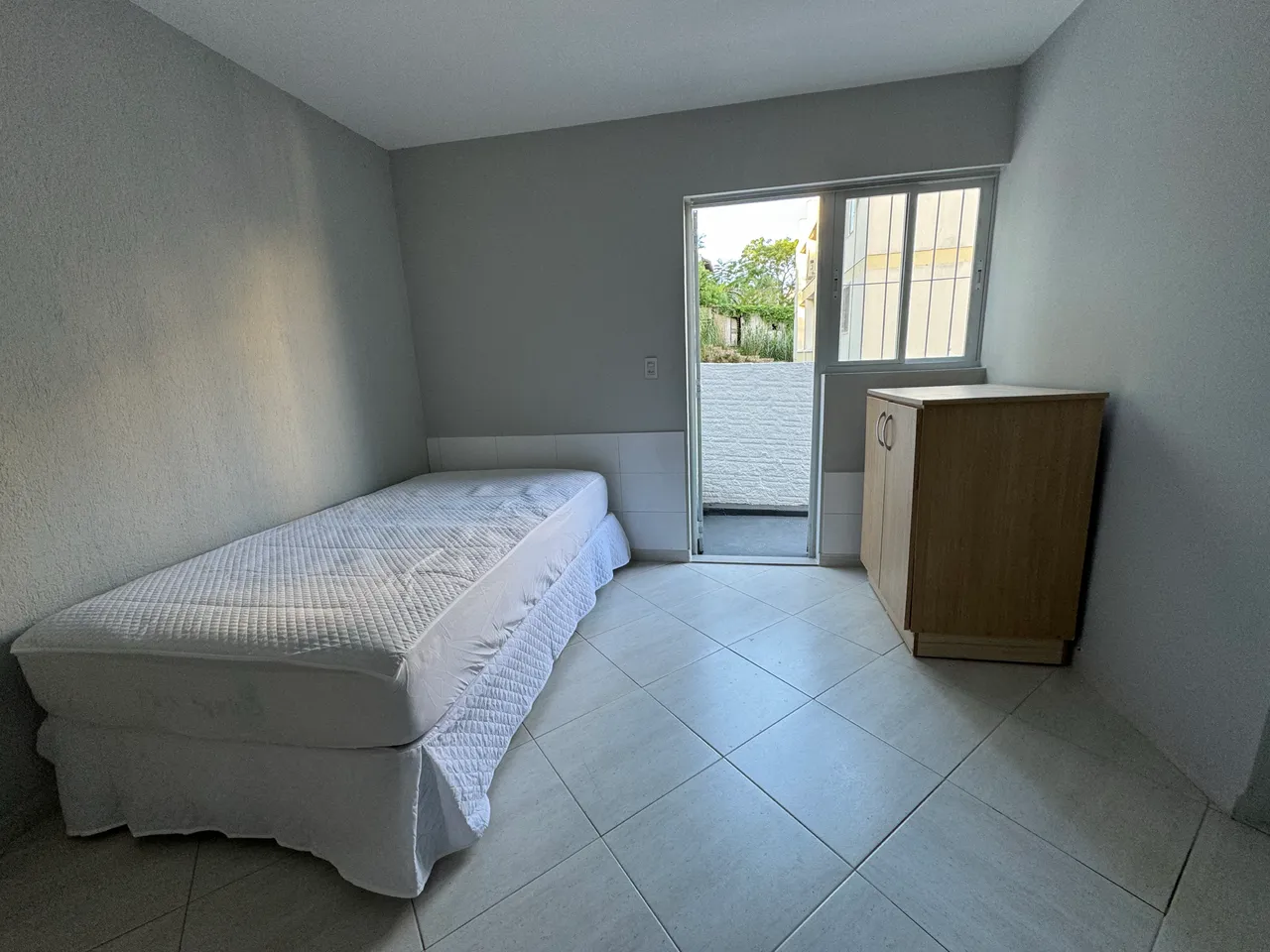 Unfurnished studio with glass shower and 1 bathroom