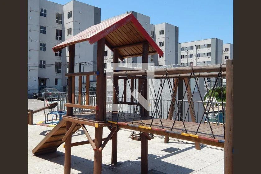 2-bedroom apartment in a building with a pool — photo 19