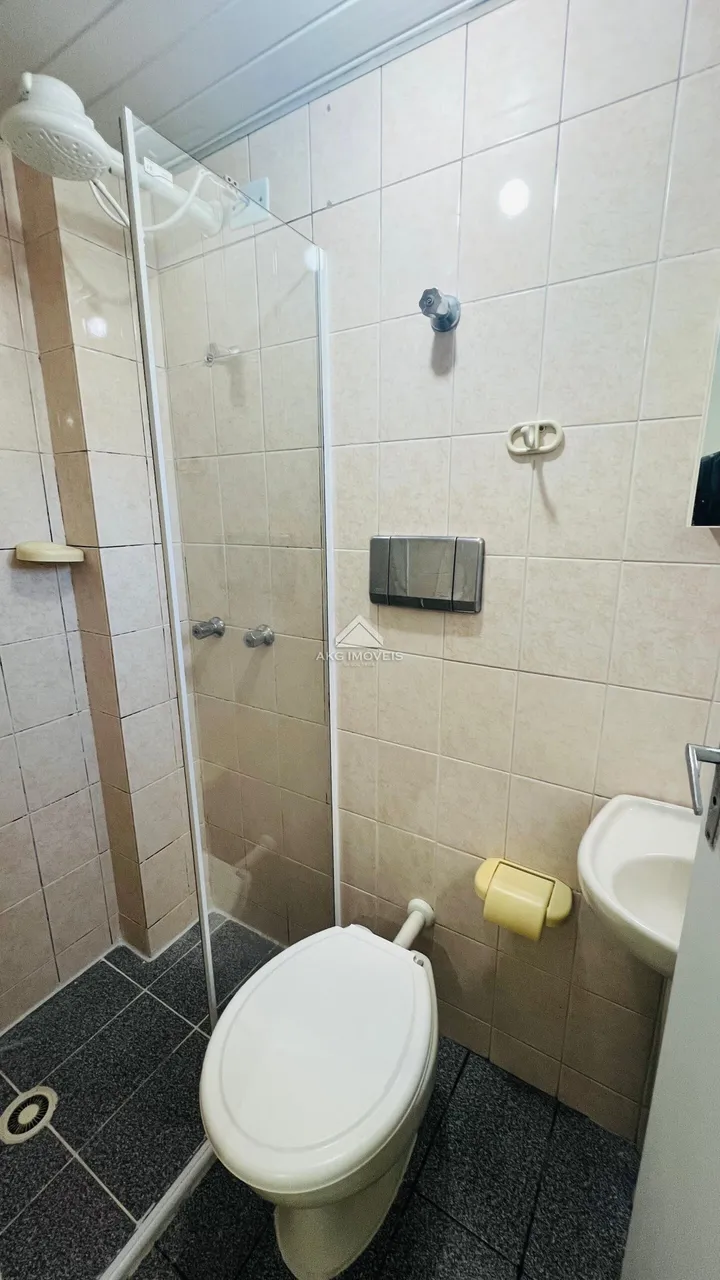1-bedroom apartment with tiled floors throughout — photo 7