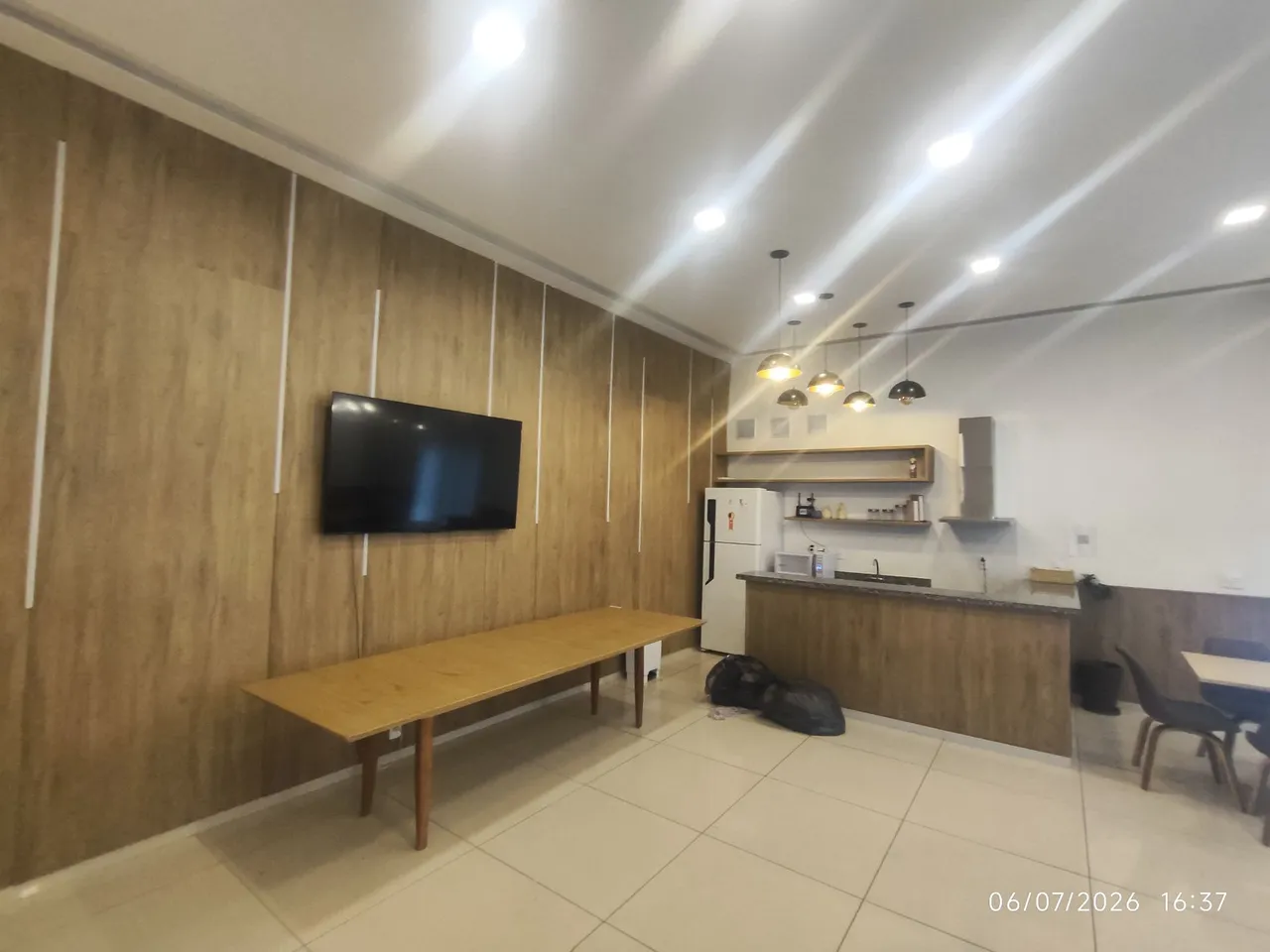 2-bedroom apartment in a building with a pool — photo 7