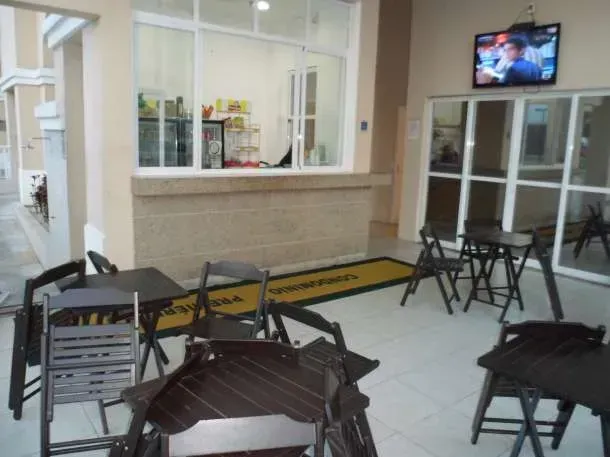 2-bedroom apartment in a building with a pool — photo 12