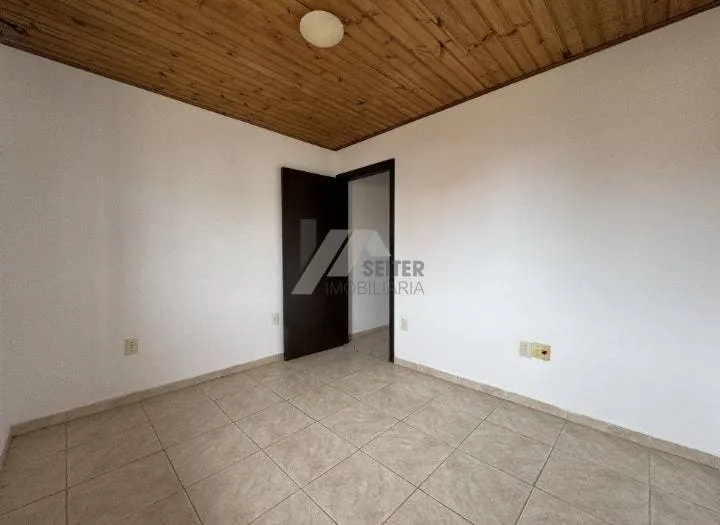 Balcony with a grill in a 2-bedroom house, 80 m² — photo 14