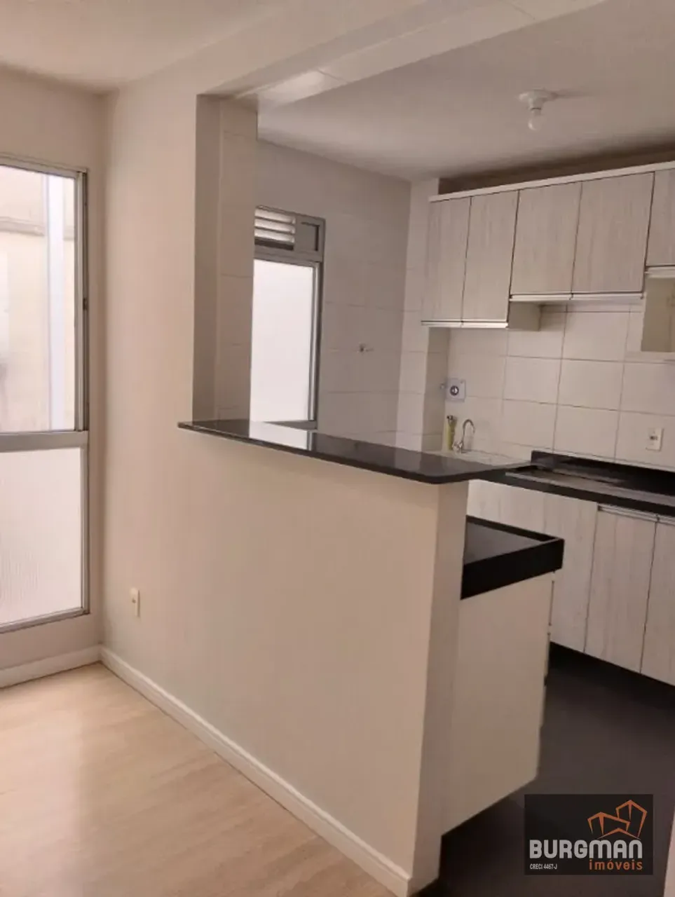 2-bedroom apartment with 1 parking space and laundry area — photo 12