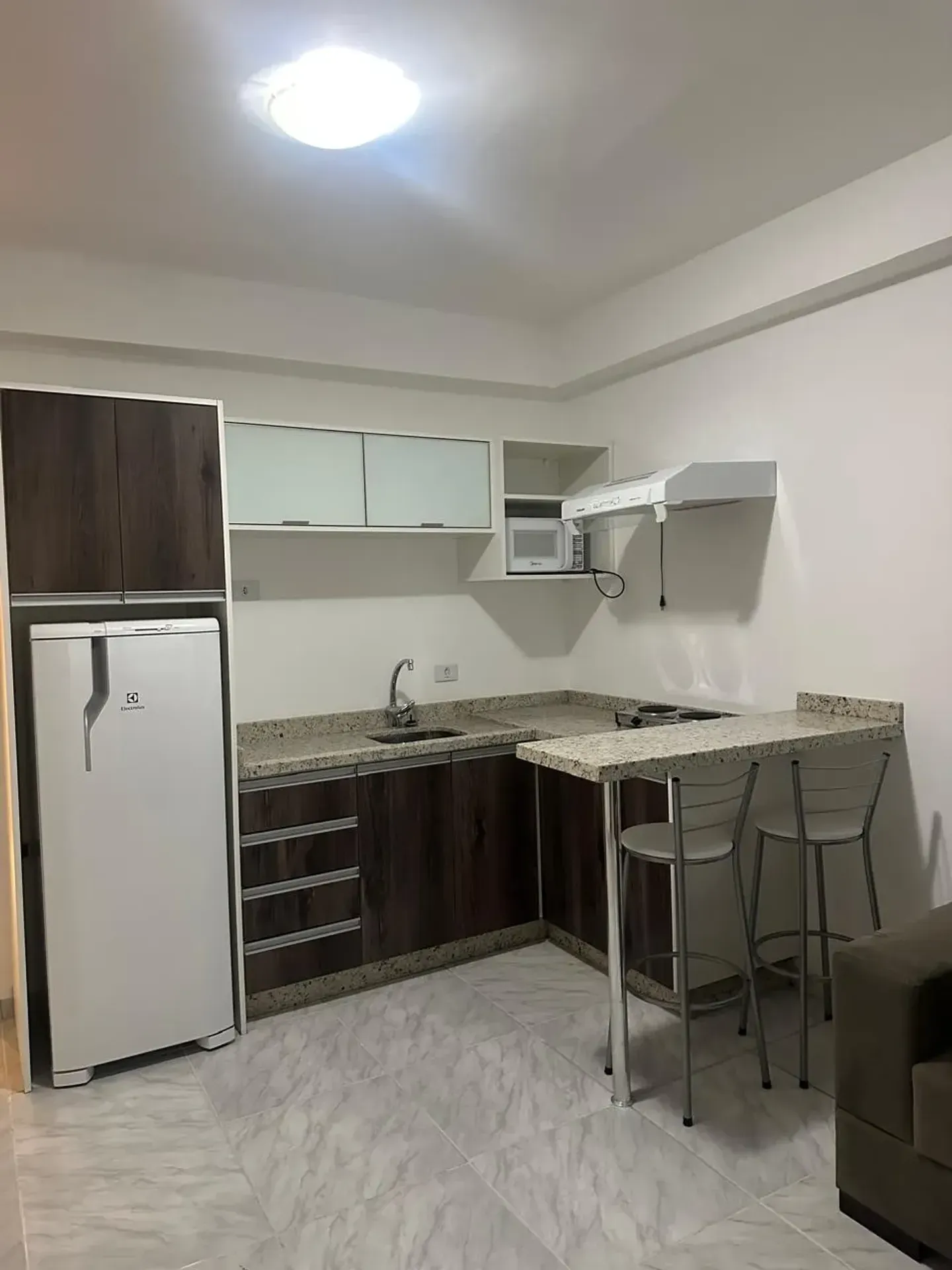 Furnished apartment with 1 bedroom and open-plan kitchen — photo 29