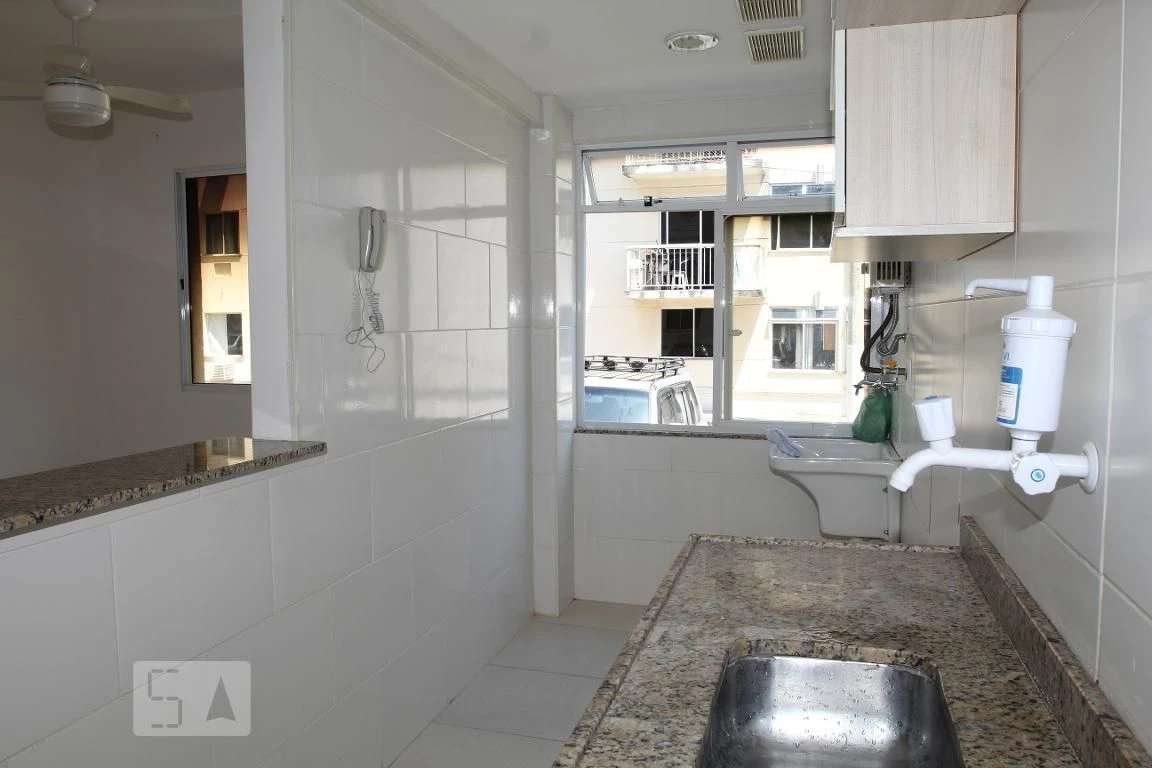 2-bedroom apartment in a building with a pool — photo 4
