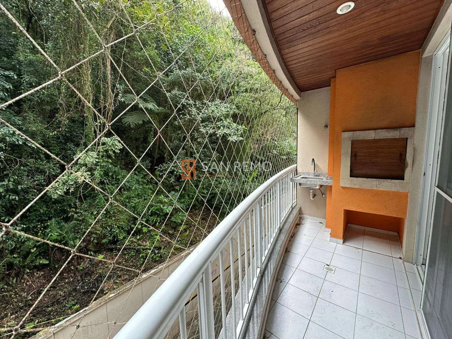 2-bedroom apartment in a building with a pool