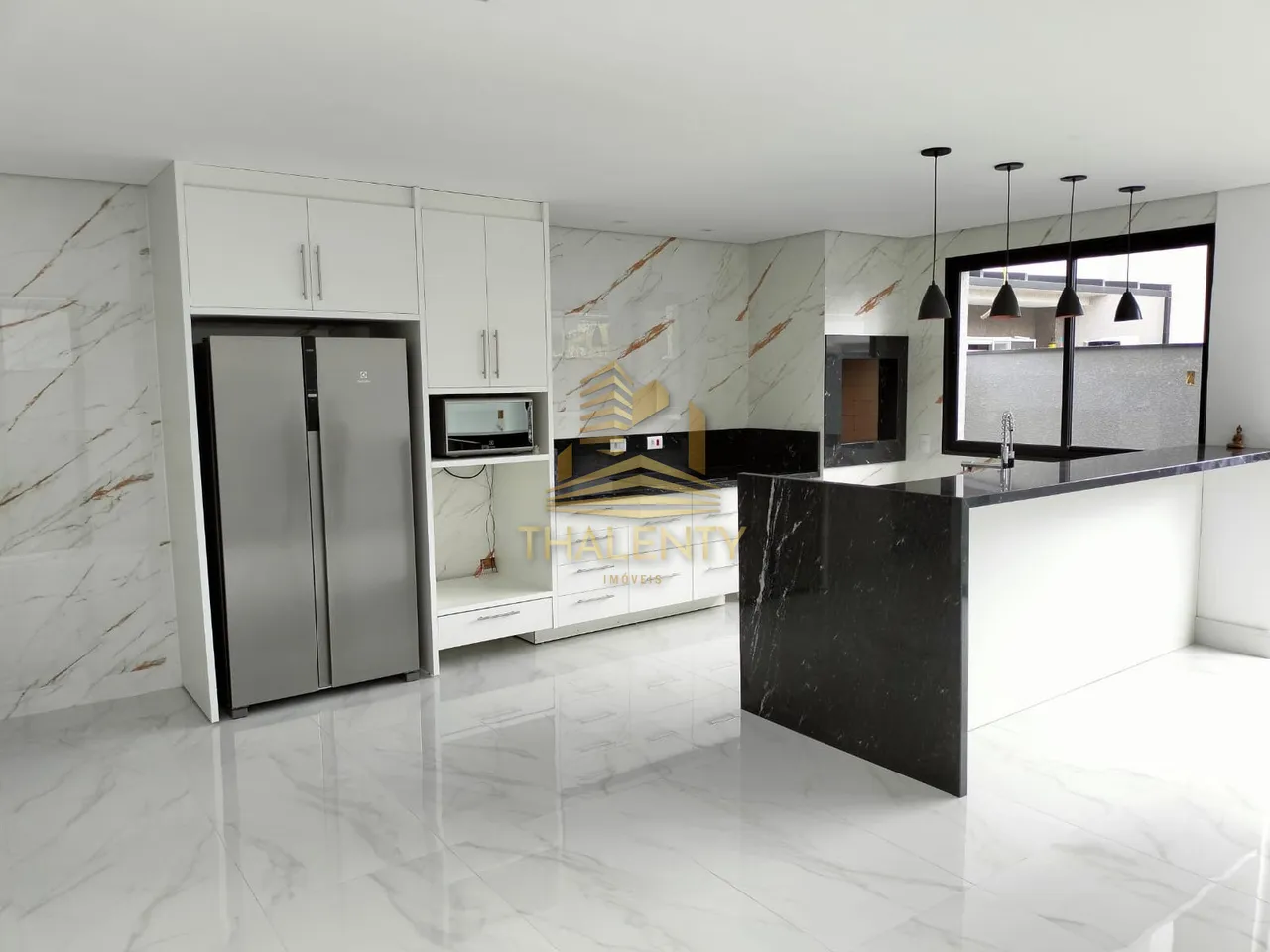 Casa em condomínio com cozinha conceito aberto e 3 suítes — photo 3