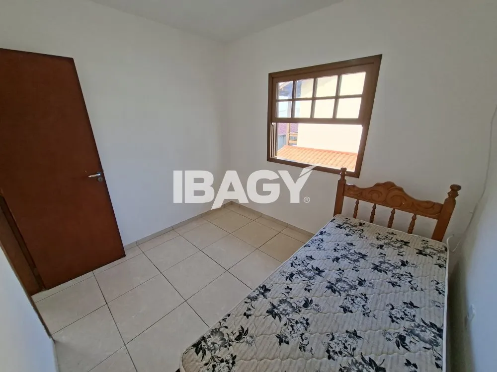House with 2 bedrooms and a kitchen with stove and hood — photo 10