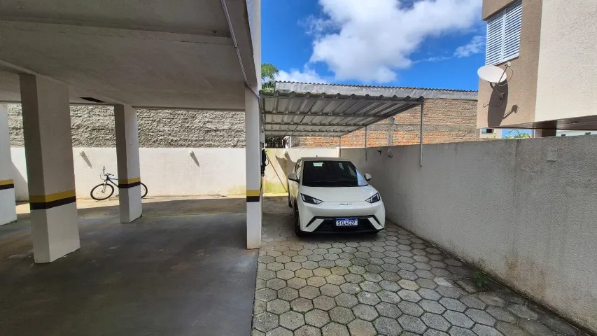 3-bedroom apartment in a building with a pool
