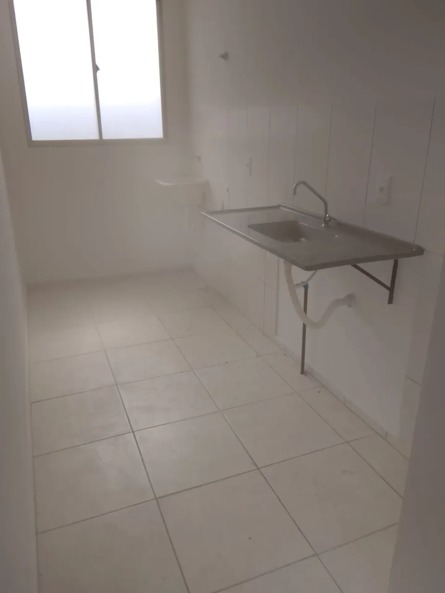 2-bedroom apartment in a building with a pool — photo 2
