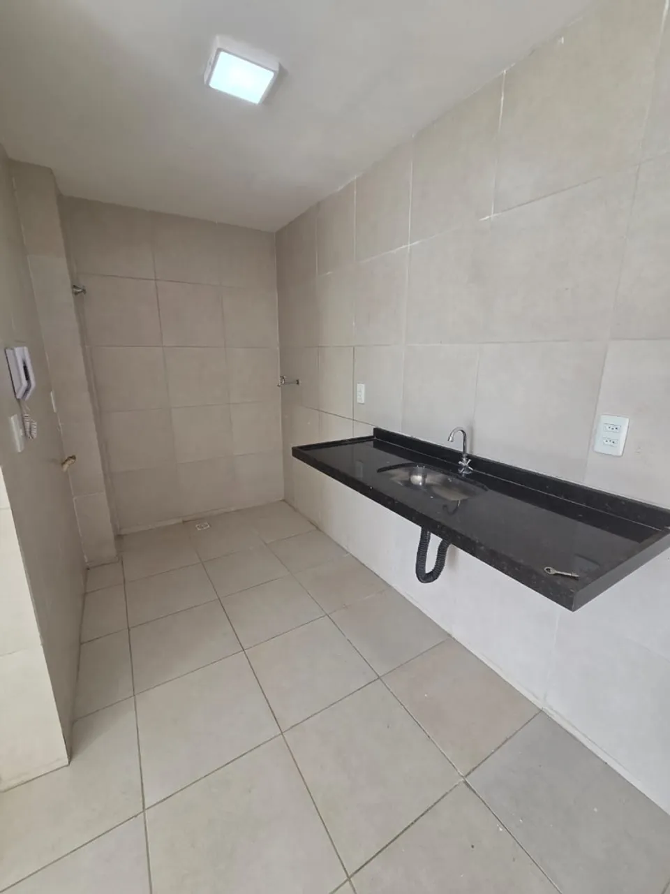 2-bedroom apartment in a building with a pool — photo 2