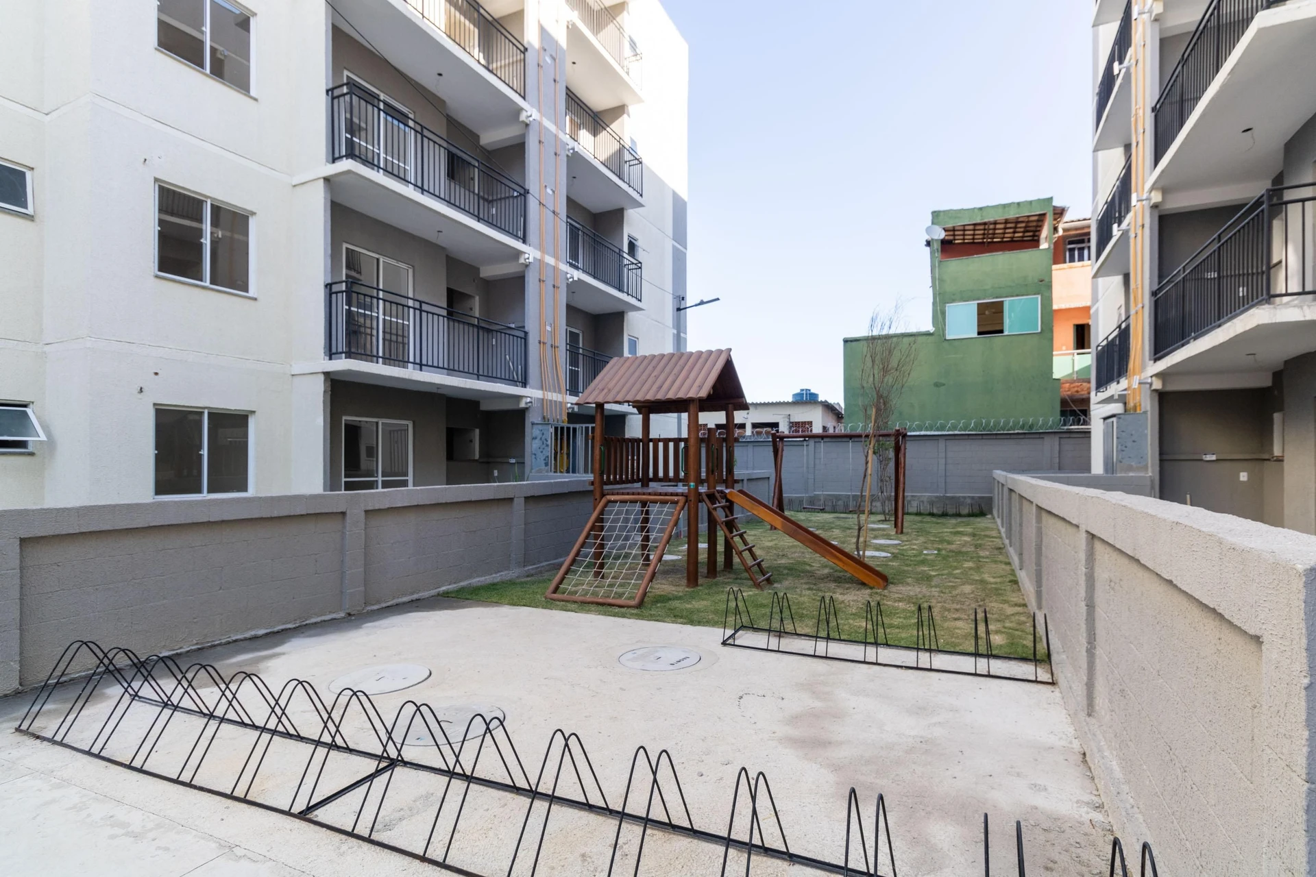 2-bedroom apartment in a building with a pool — photo 22