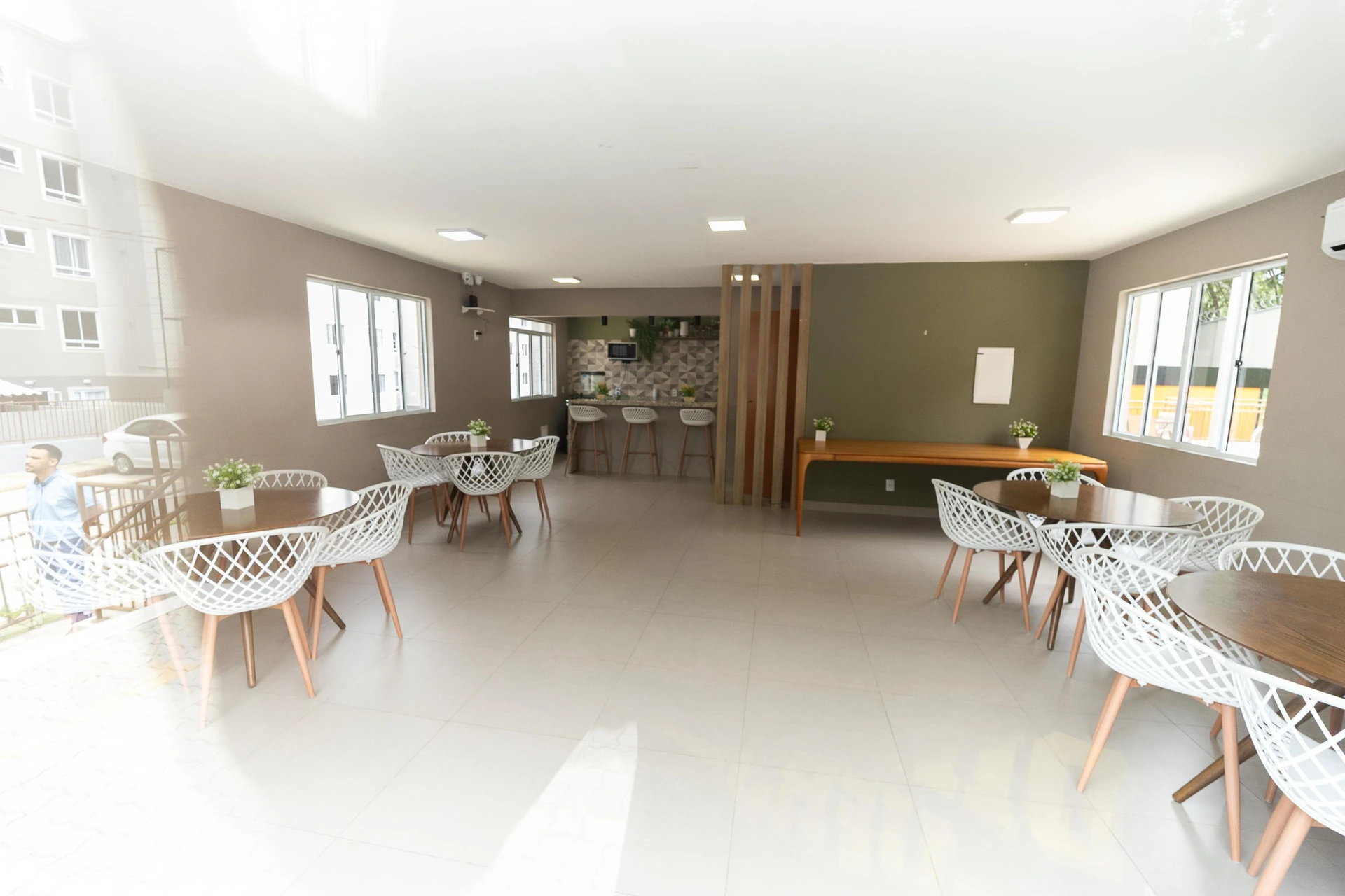 2-bedroom apartment in a building with a pool — photo 13