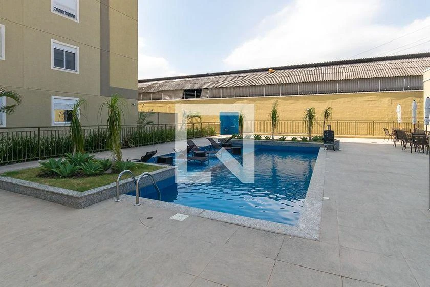2-bedroom apartment in a building with a pool — photo 4