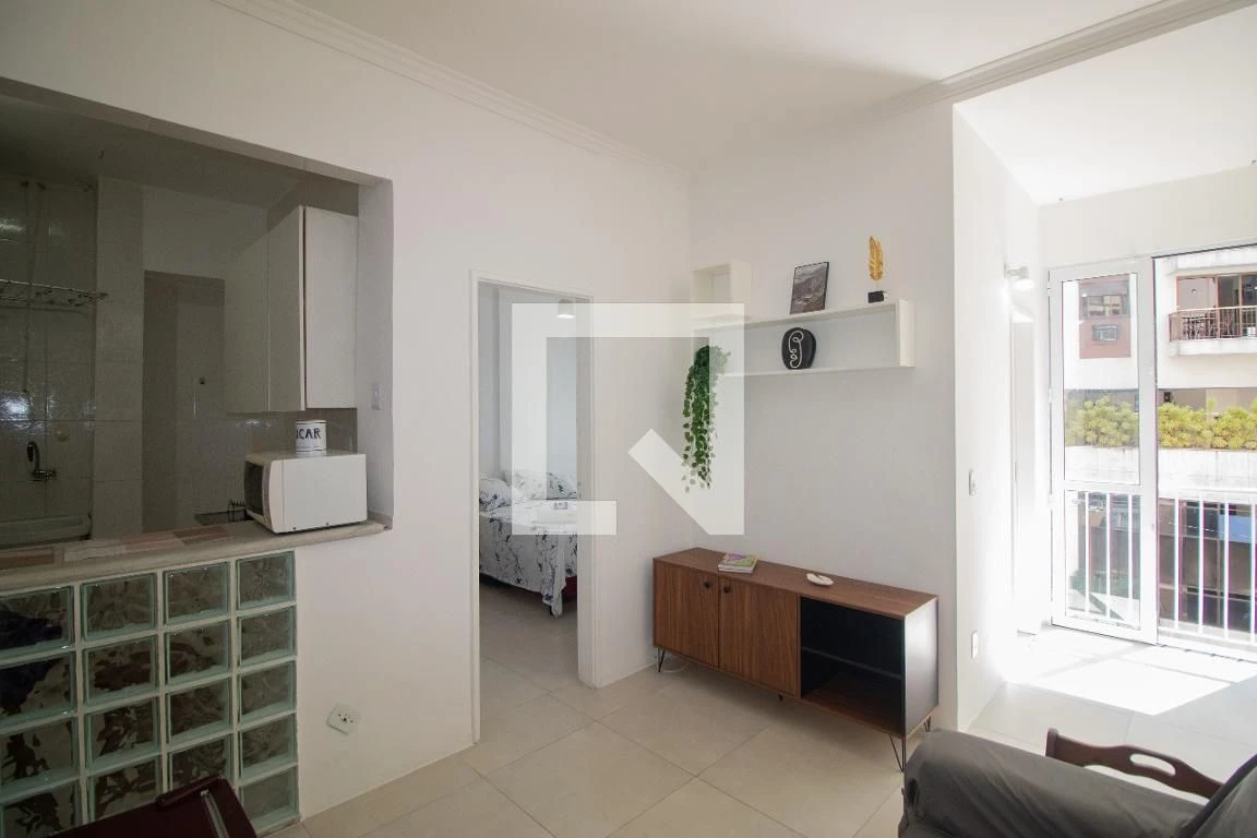 1-bedroom apartment with open kitchen and electric stove — photo 16