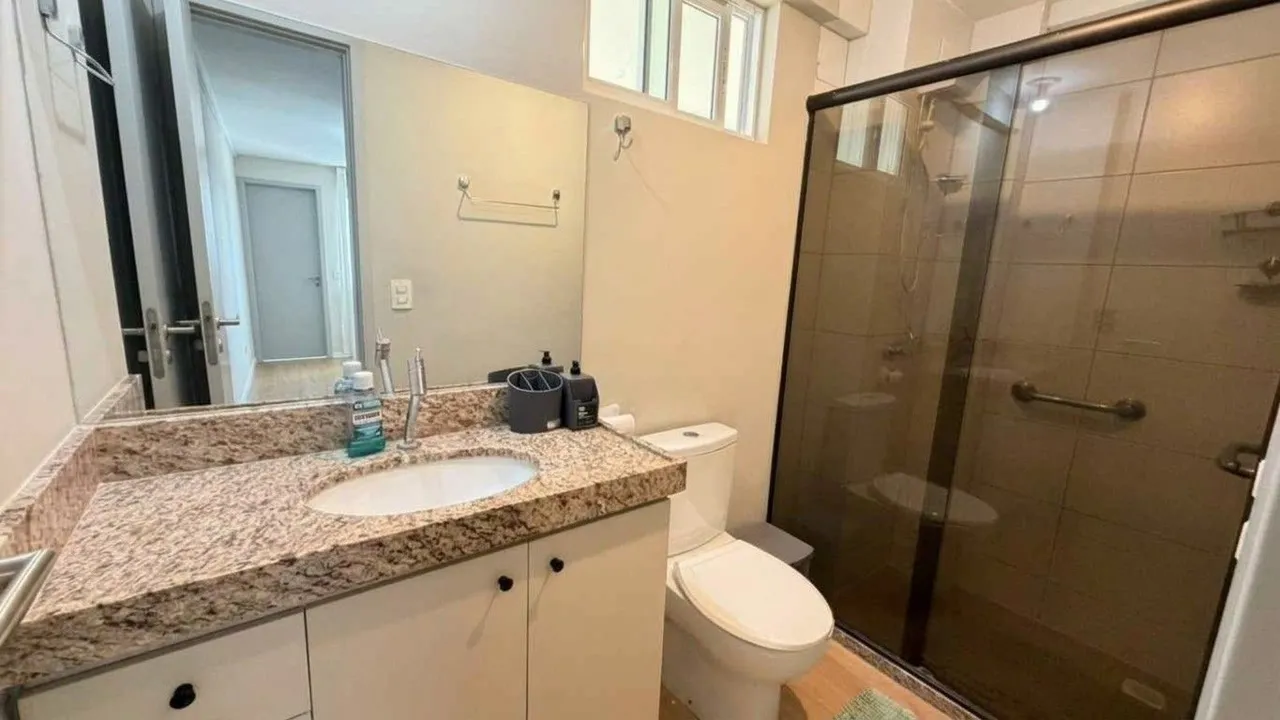 2-bedroom apartment in a building with a pool — photo 2