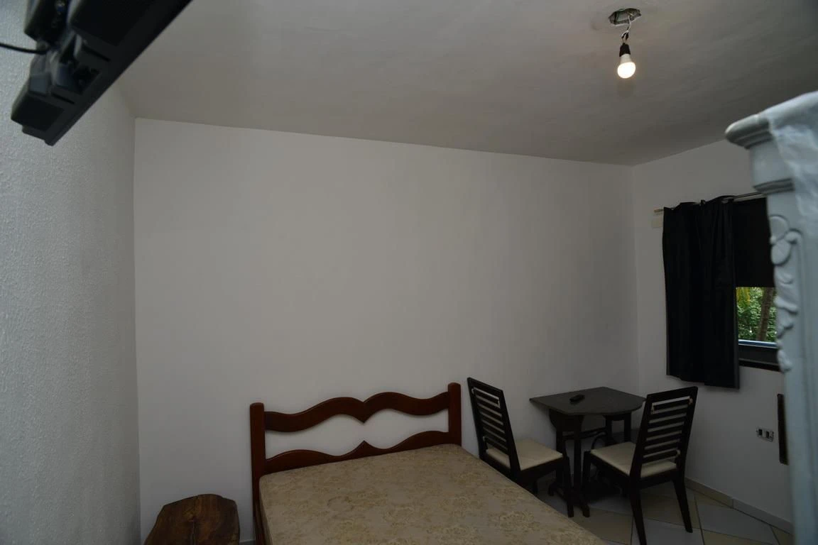 One-bedroom apartment in a building with a pool — photo 10
