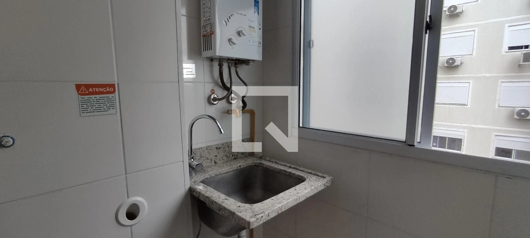 2-bedroom apartment in a building with a pool — photo 7
