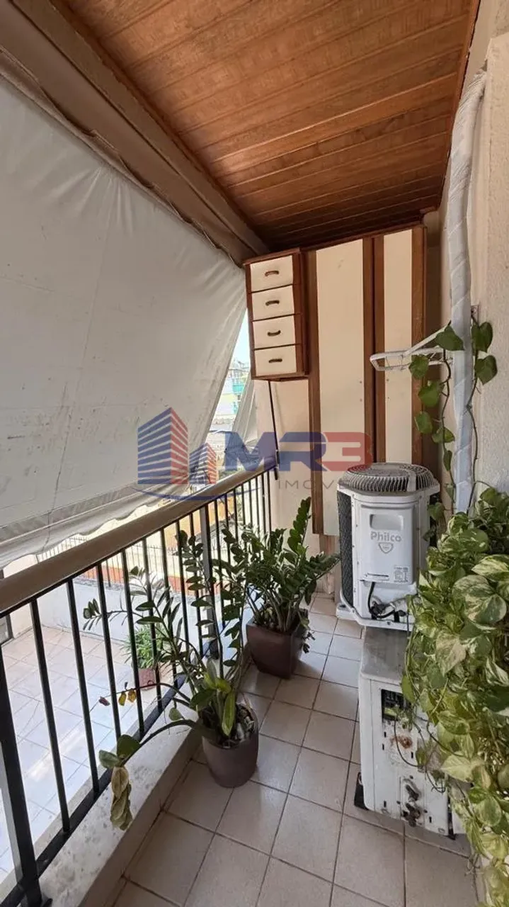 Balcony with a grill in a 2-bedroom apartment, 60 m² — photo 16