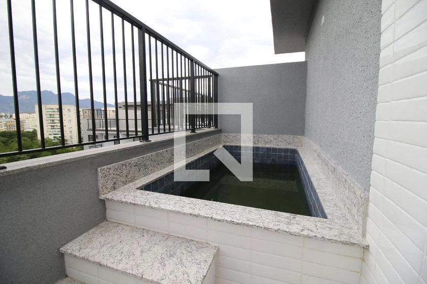 2-bedroom apartment in a building with a pool — photo 22