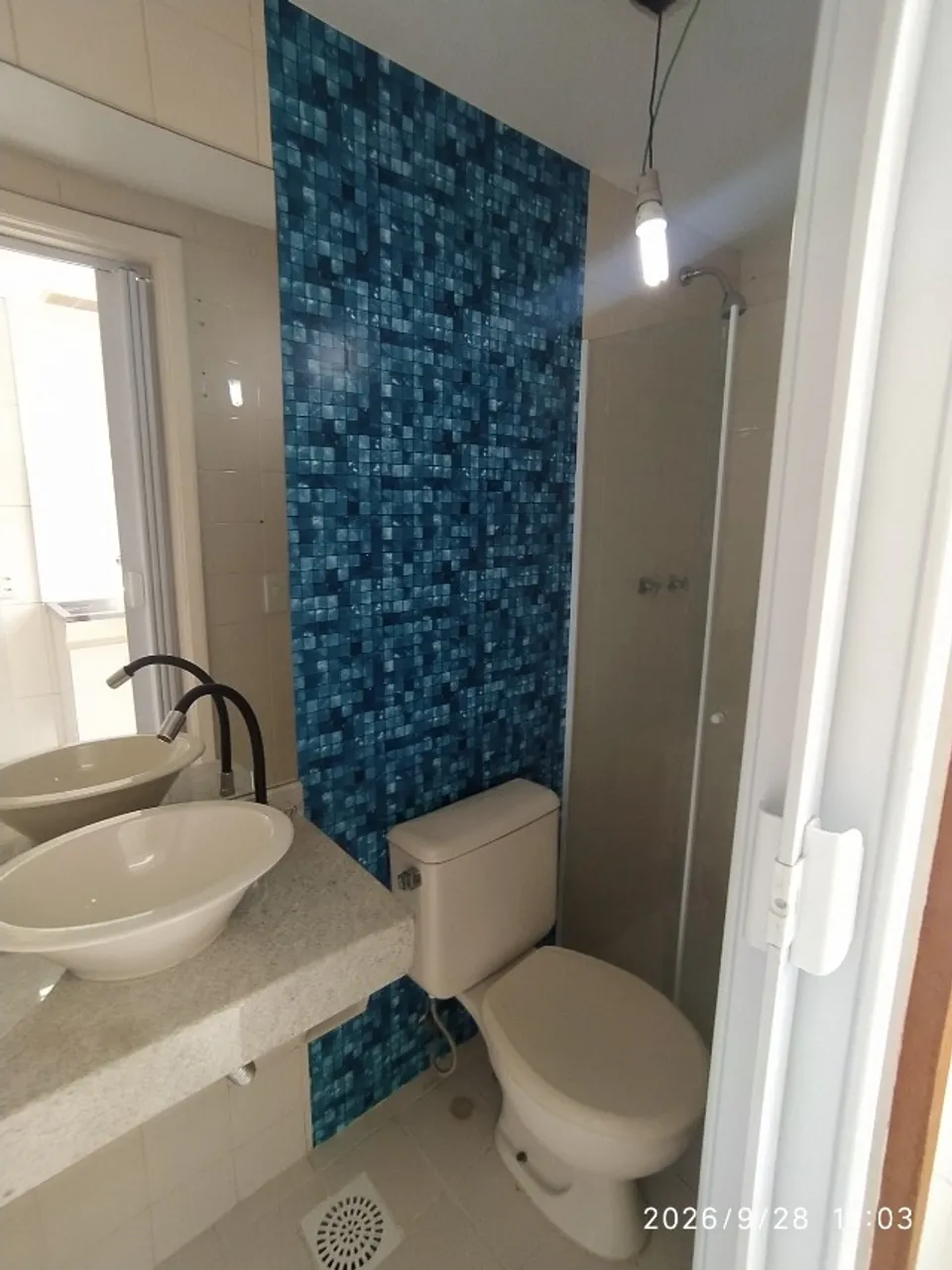2-bedroom apartment in a building with a pool — photo 16