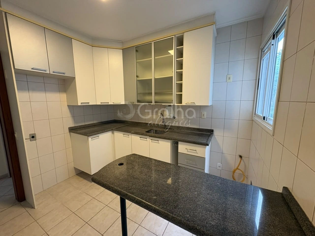3-bedroom apartment in a building with a pool — photo 2