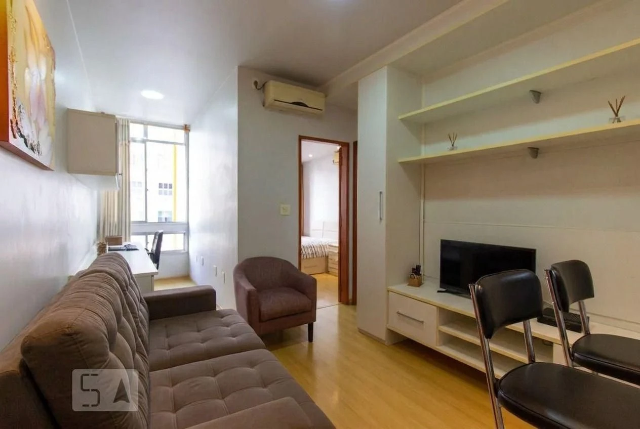 Furnished 1-bedroom apartment with a laundry area — photo 6