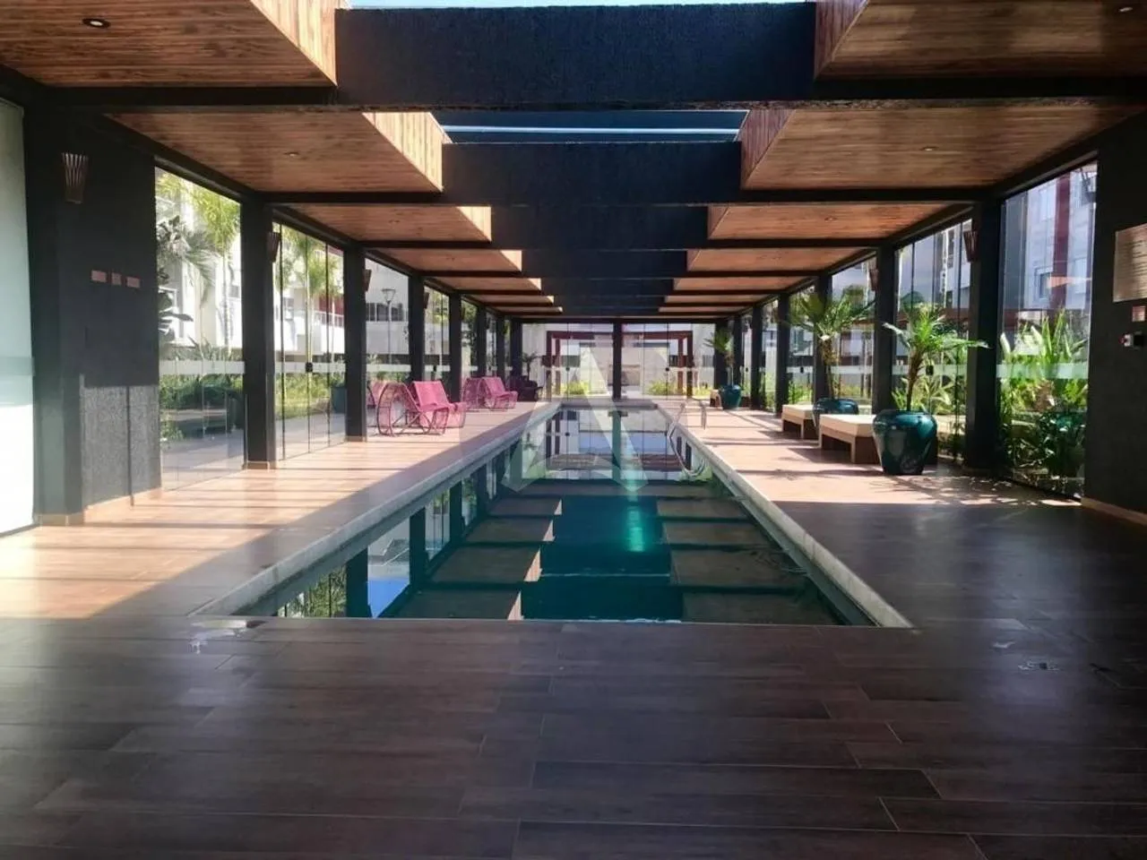 2-bedroom apartment in a building with a pool — photo 24